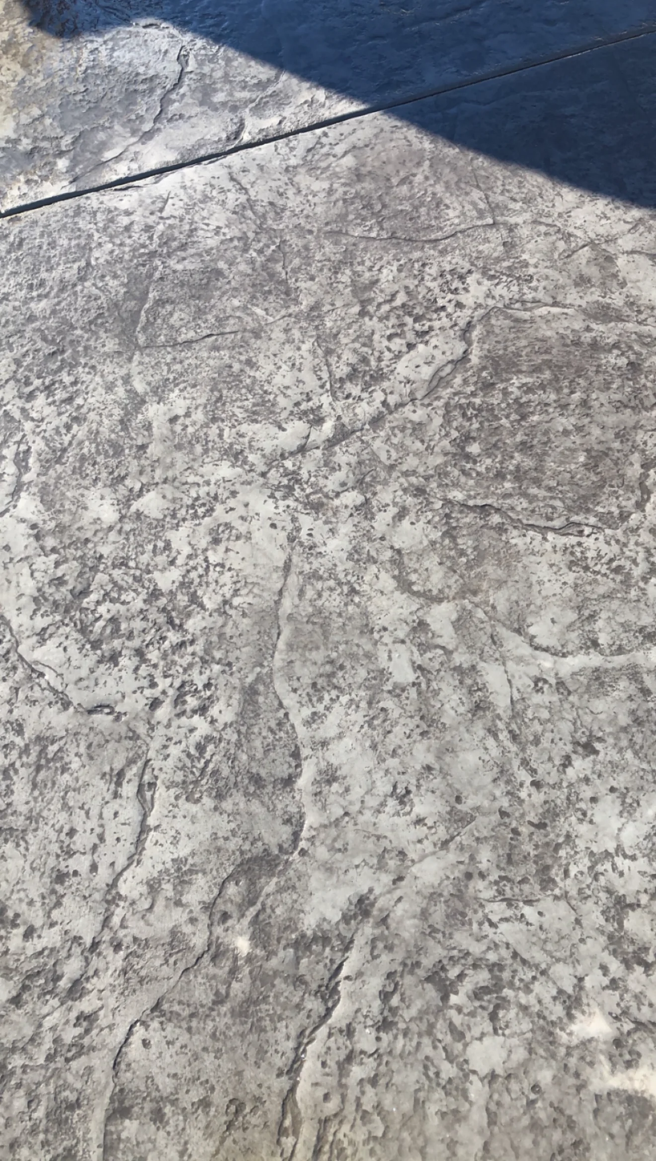 Stamped concrete finish with decorative patterns